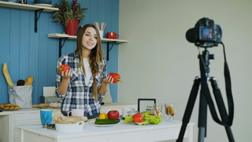 10 Influencer Marketing Trends To Follow in 2026 9 content creator recording video vlog on dslr camera